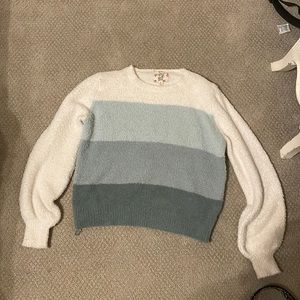 white and blue sweater